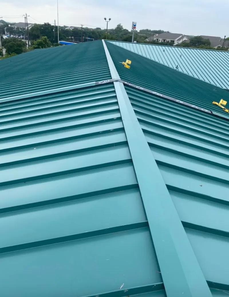 Green commercial metal roof ridge and valley for Metal Roof Repair in DuBois